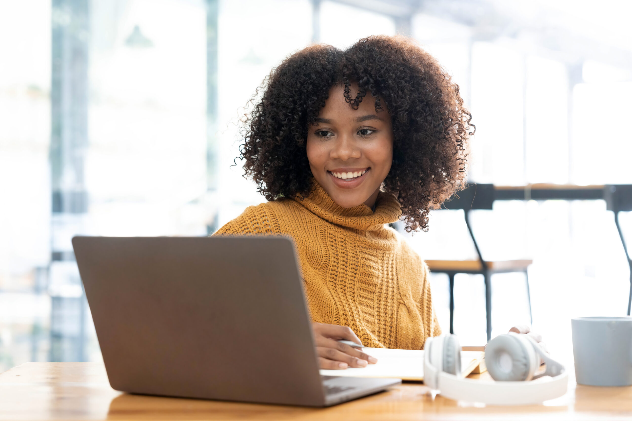 Photo Of Cheerful Joyful Mixed-race Woman In Yellow Shirt Smilin About pdl